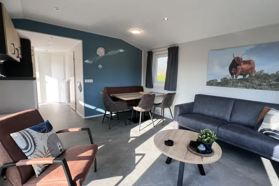 Camping Coogherveld Texel - chalet type 1 woonkamer blauw - vakantiehuisje