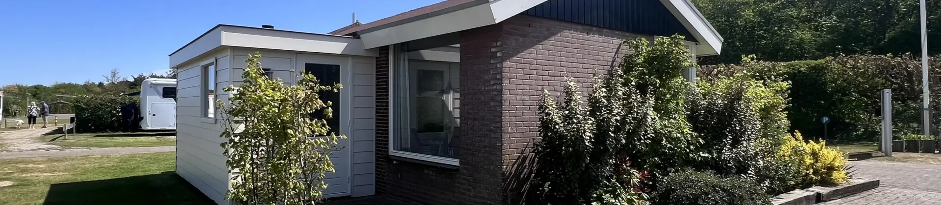 camping Coogherveld Texel vakantiehuisje Boszicht voordeur