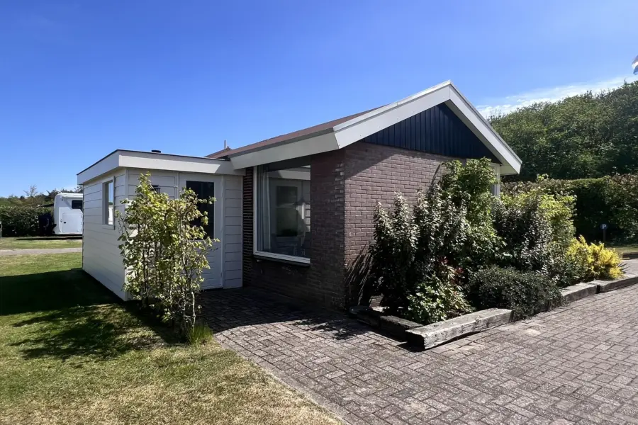 camping Coogherveld Texel vakantiehuisje Boszicht voordeur